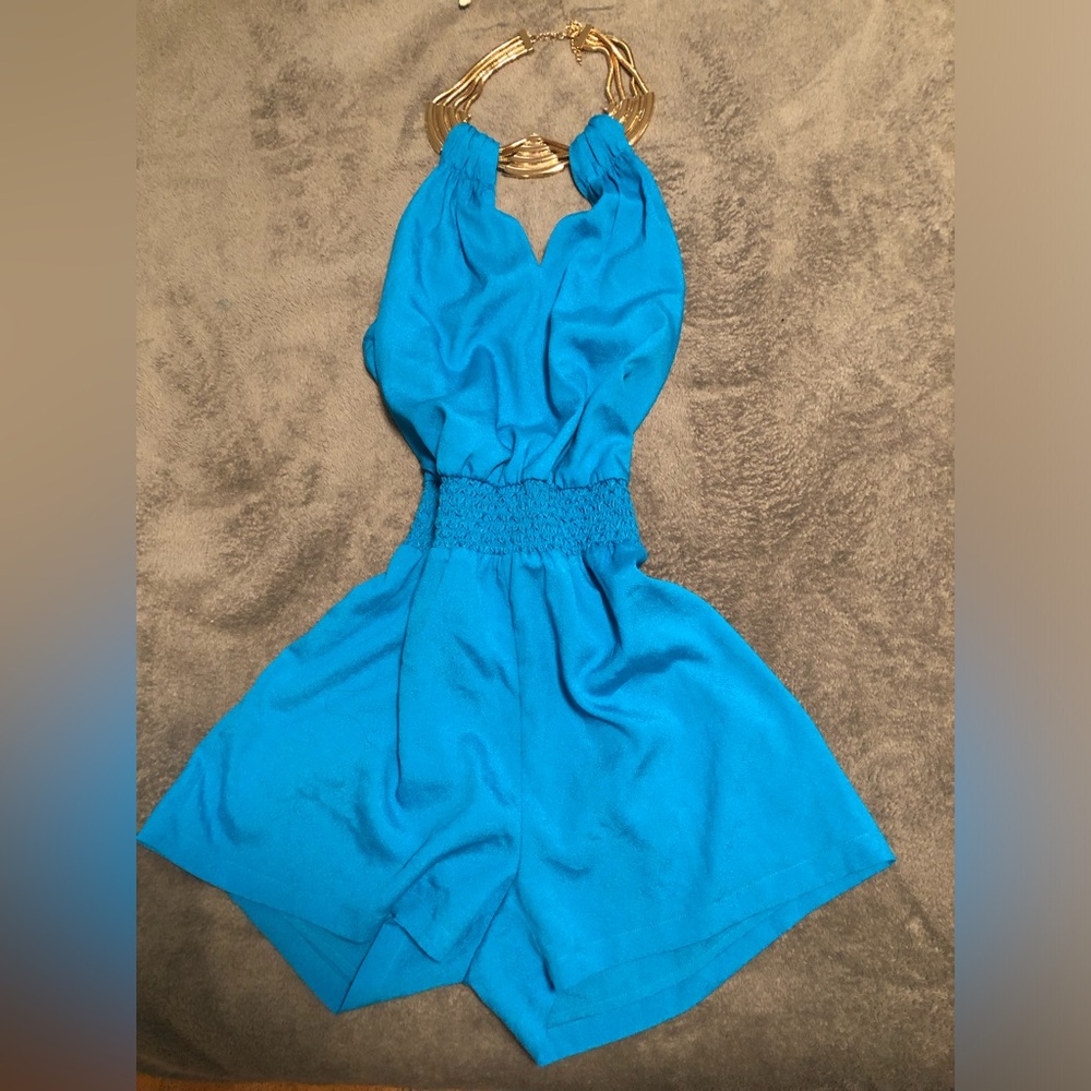 Open back Bebe romper with necklace